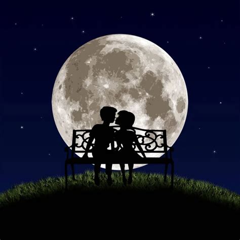 Silhouettes Of Man And Woman Sitting On A Bench At Night Time On The