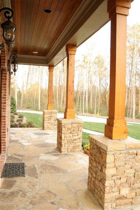 Front porches contribute immeasurably to issues of lifestyle, function and curb appeal. Western Red Cedar 8x8 Beams used for the columns and V ...