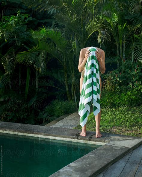 Anonymous Woman Under Towel In Poolside After Swimming By Stocksy Contributor Duet