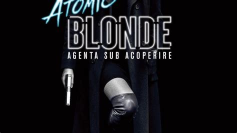 An undercover mi6 agent is sent to berlin during the cold war to investigate the murder of a fellow agent and recover a missing list of double agents. Atomic Blonde. Charlize Theron este agenta sub acoperire
