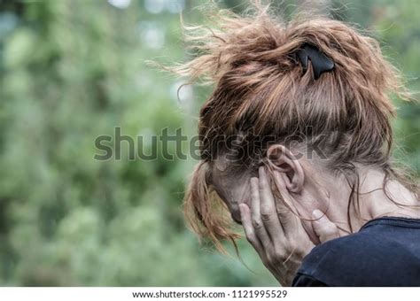 Portrait Woman Holding Her Head Her Stock Photo 1121995529 Shutterstock