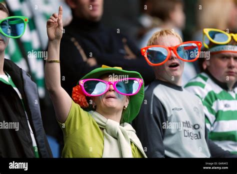 celtic s fans taunt the rangers fans by wearing their summer clothing in preperation to going to