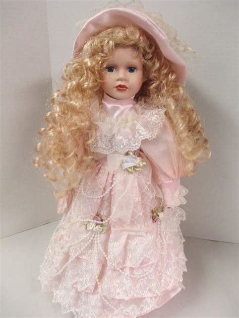 Vintage Porcelain Curly Blond Hair Blue Eyed Doll 17 Inch Pink