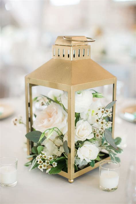White Flowers In Lantern Centerpiece Eric Boneske Photography Wedding