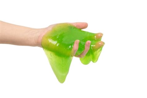Premium Photo Dripping Green Slime In Hand