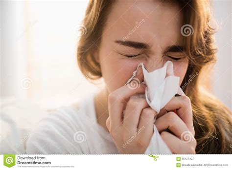 Woman Blowing Her Nose On Couch Stock Image Image Of Illness Indoors