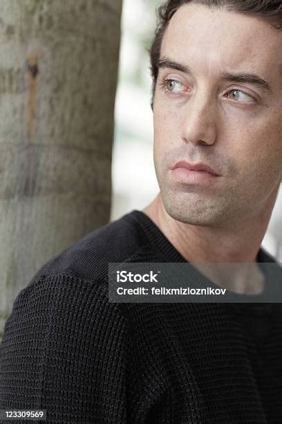 Man Looking Over His Shoulder Stock Photo Download Image Now 30 39