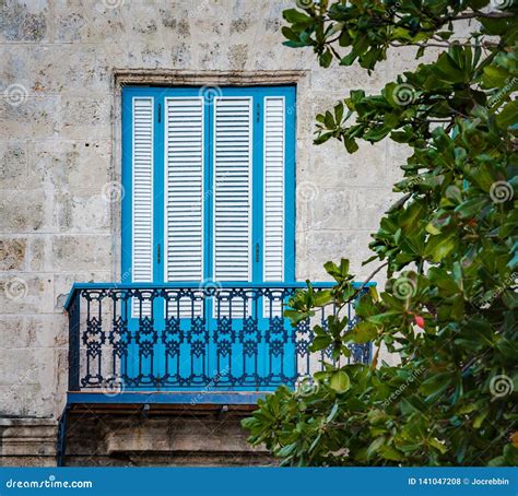 Colorful Turquoise Shutters Of Colonial Balcony In Havana Vieja Old