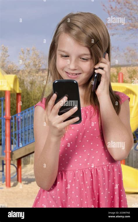 Little Girl Using Cell Phones Stock Photo Alamy