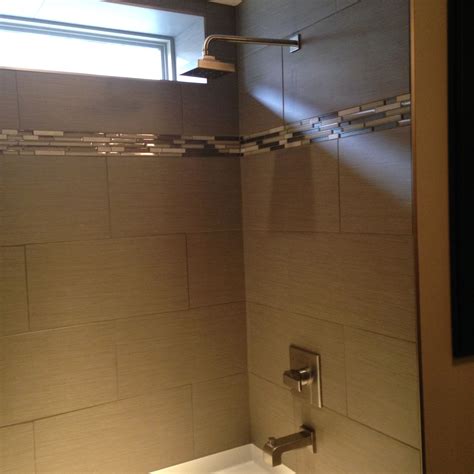 Custom Tiled Showertub In A 12x24 Tile In A Horizontal Install With A