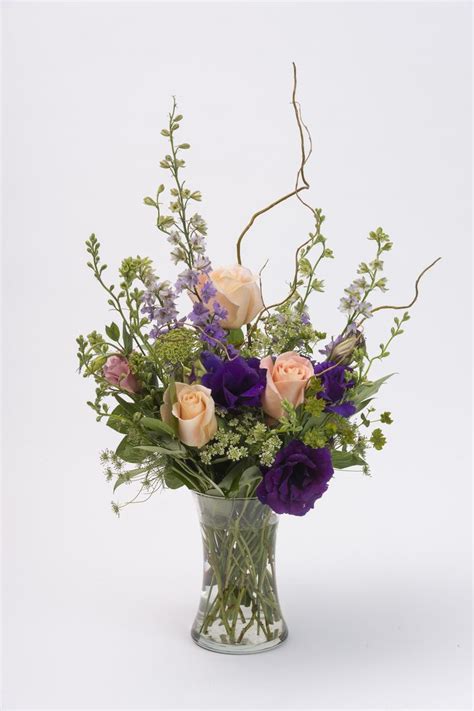 Field Of Wildflowers This Gathering Vase Features Purple Lisianthus