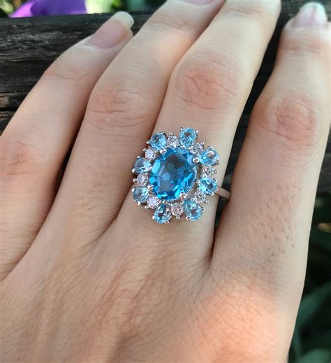 Swiss Blue Topaz Cluster Solitaire Halo Ring Large Oval Blue Topaz