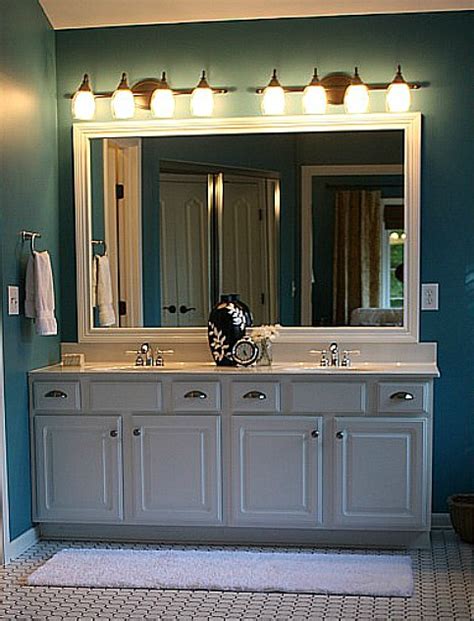 Methods 2 putting mirrors in picture frames 3 framing mirrors in creative ways the first is building your own frame around the mirror using baseboard molding, which requires. bathroom plate glass mirror framed with molding - Hooked ...