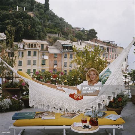 Italian Actress Daniela Bianchi Poses In A Hammock On The Terrace Of