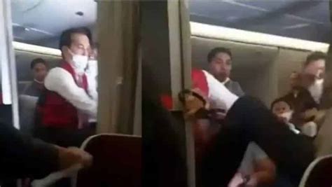 Viral Video Emergency Landing Of Plane As Drunk Passenger Bites Flight Attendants Finger The