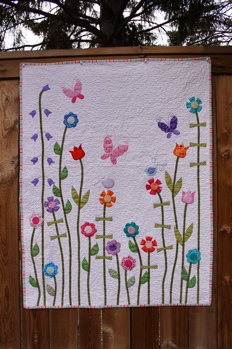 Making More With Less Baby Girl Flower Applique Quilt