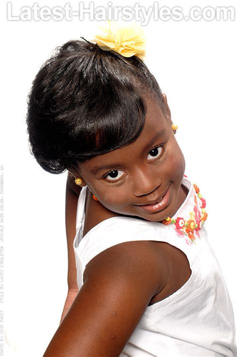 However, for a kid, managing an afro image: 15 Stinkin' Cute Black Kid Hairstyles You Can Do At Home