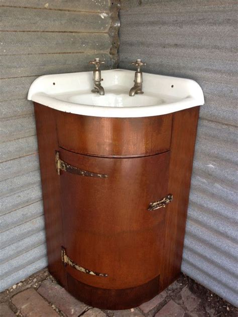 In reality, these understated units can make or break a bathroom's visual impact. Rustic industrial iron corner vanity unit. - Old Soul