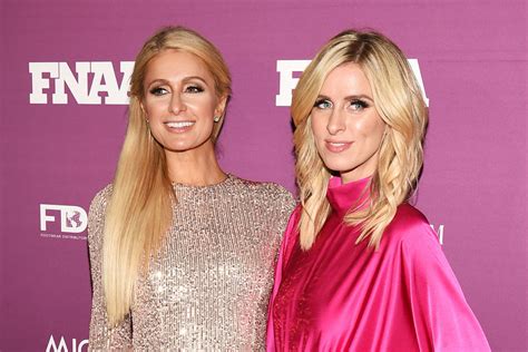 Sisters Paris Hilton And Nicky Hilton Reunite And Twin In Matching Summer Floral Dresses