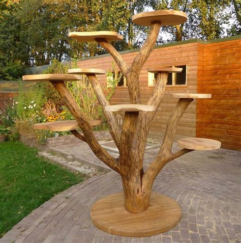 Large cats need a cat tower that's durable and can handle the force of them jumping on and off it with ease. Different Styles of DIY Cat Tree | Outdoor cat tree, Diy ...