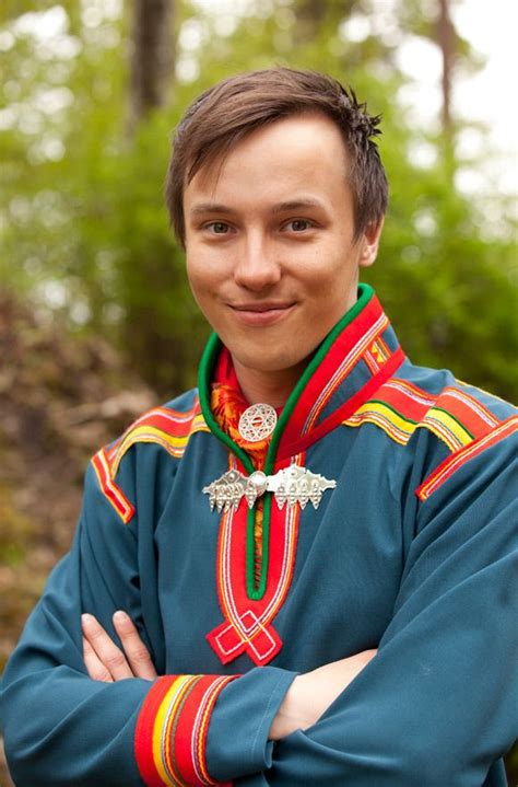 Young Man In The Traditional Dress Of The Indigenous Scandinavian Sami