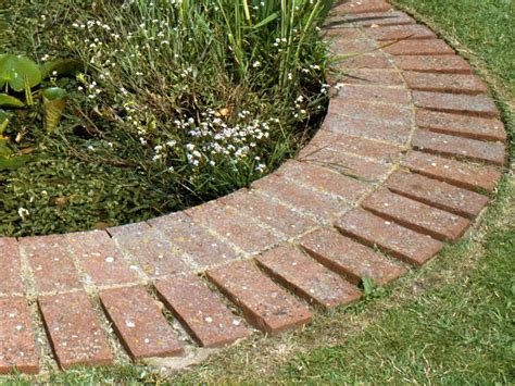 They're ideal when you want a wide. Installing Brick Edging | Brick edging, Landscape edging ...