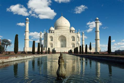 Reflection Of The Taj Mahal Mausoleum In The City Of Agra Stock Photo