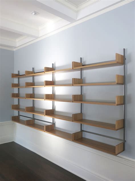 As4 Modular Shelving System In White Oak And Cold Rolled Steel Wall
