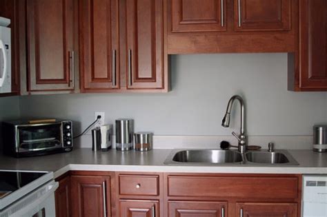 Grey kitchen walls with cherry cabinets. stonington gray paint - love this colour!! | Grey kitchen ...
