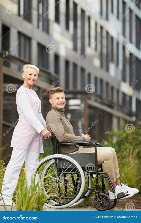Mature Nurse Working With Recovering Patient Stock Photo Image Of