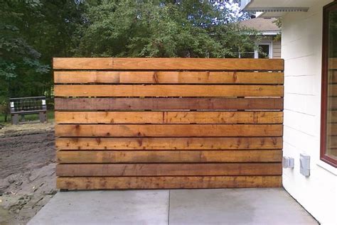 Horizontal slat style railing with or without wood top rail.… people also love these ideas. horizontal slat fence | fence | Pinterest