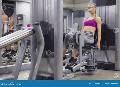 Young Woman Training Hard At The Gym Stock Photo Image Of Muscle