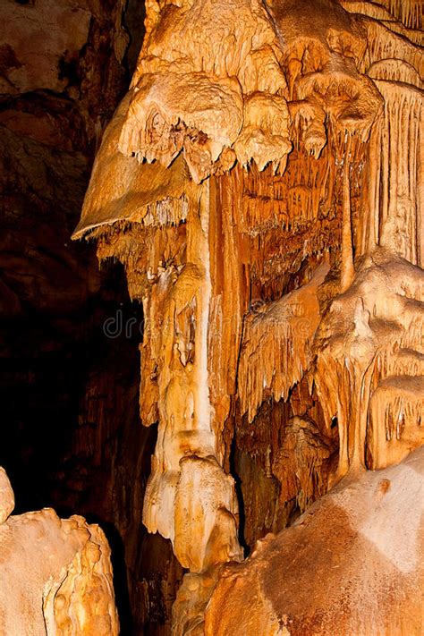 Stalactite And Stalagmite Formations On The Wall Of An Underground Cave