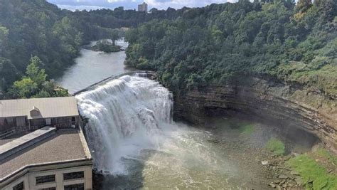 At Genesee Valley Park The Genesee River Begins Her Journey Through The City Racing Over A Dam