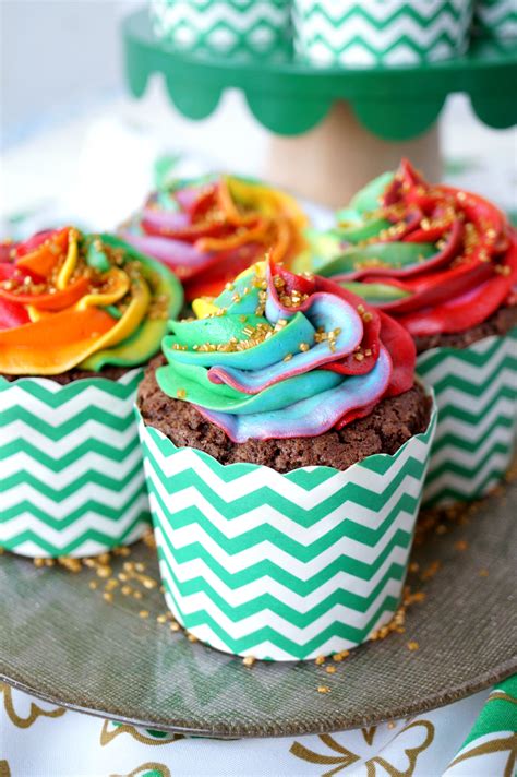 Make a batch of keto rainbow cupcakes and take them to a pride party to share with your low carb. chocolate Bailey's cupcakes with rainbow frosting | The ...