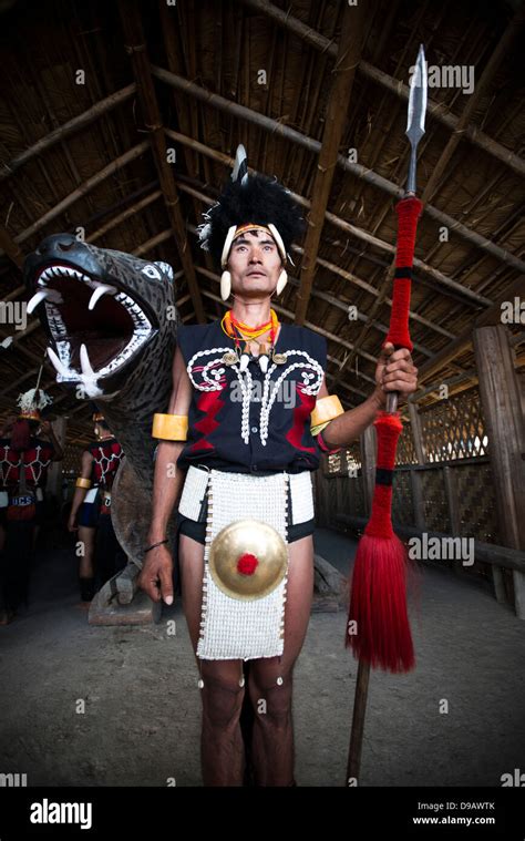 Naga Tribal Warrior In Traditional Outfit Standing With A Spear In A