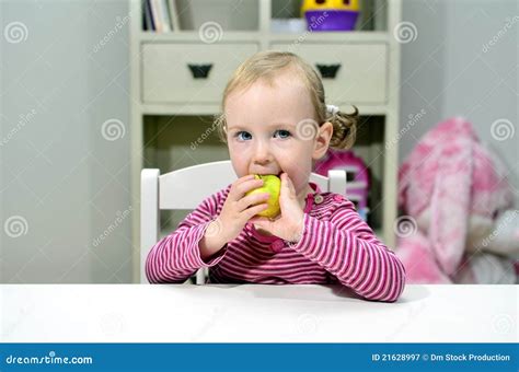 Little Girl Eating Green Apple Stock Image Image Of Food Indoor