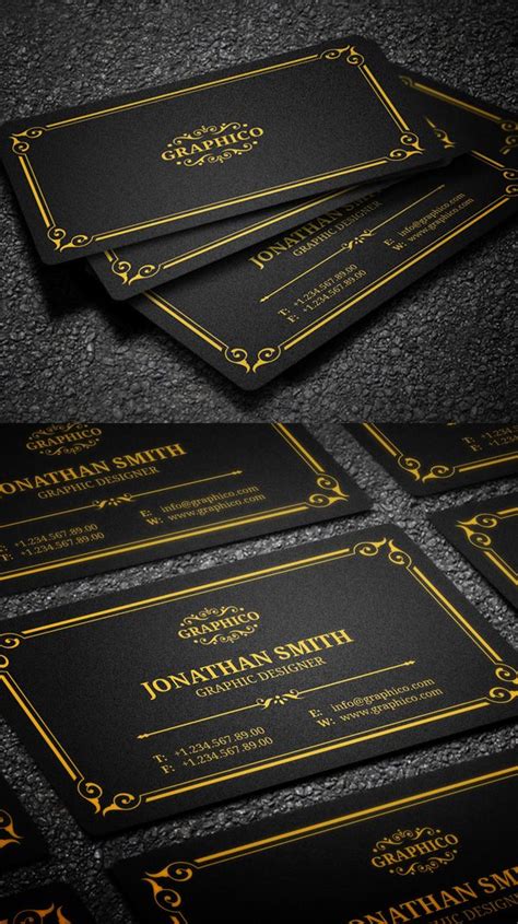 Some Black And Gold Business Cards On A Table