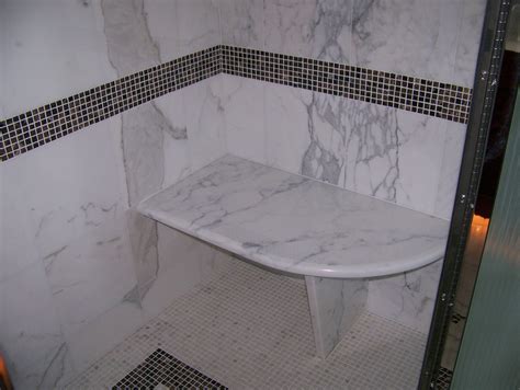 Beautiful calacatta marble slab walls, gold fixtures and accents with a stunning navy vanity creates a sleek. Calacatta marble shower seat - Traditional - New York - by ...