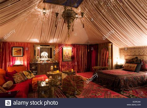 Casual bedroom style is a style that is very comfortable which describes a casual lifestyle in a bedroom set. Tent style boudoir bedroom with Moroccan rugs, oriental ...