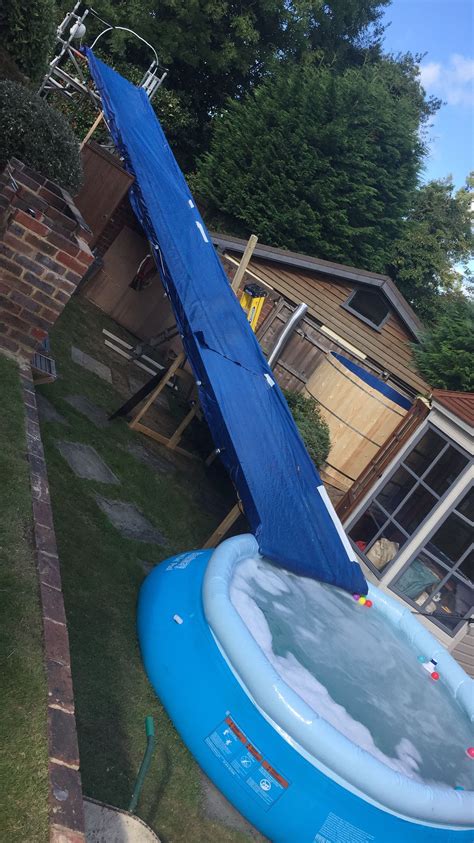 Home made water slide | Homemade water slide, Home made water slide, Homemade pool slide