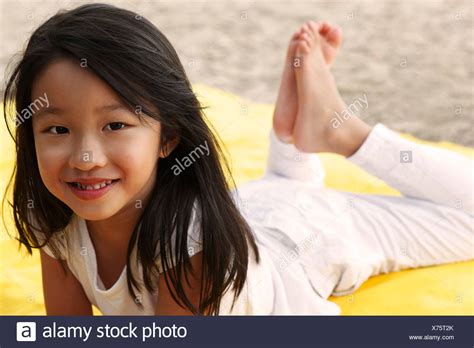 Page 3 Young Girl Laying On Stomach High Resolution Stock Photography