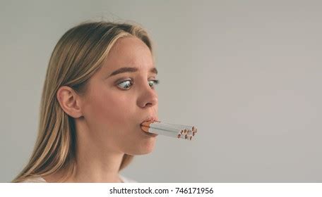 Woman Holding Many Cigarettes His Mouth Stock Photo