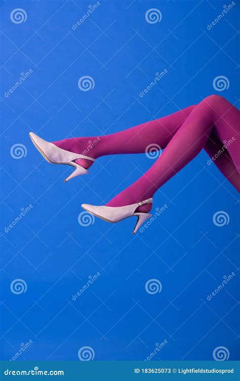 view of model in purple tights and heels posing on blue stock image image of style purple