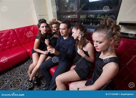 Lovelace Man Surrounded By Hot Women Wanting Royalty Free Stock Image