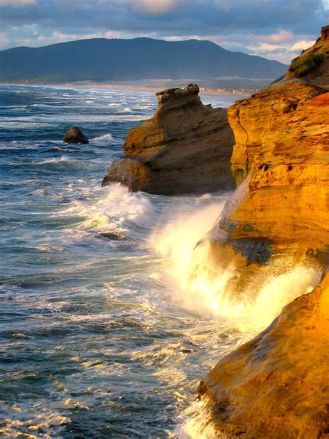 Waves Crashing Against The Rocks On The Coast