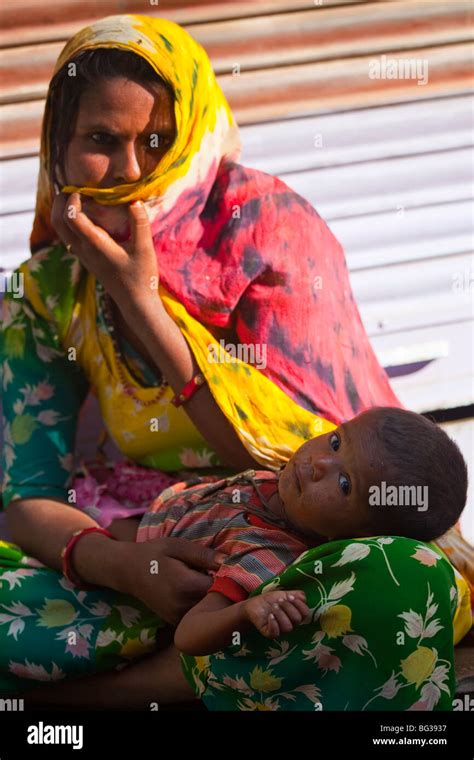 Begging Woman And Baby In Pushkar India Stock Photo Alamy