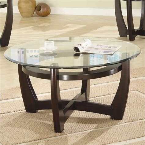 This clean contemporary design provides storage space between the tiers. Coaster 3 Piece Contemporary Glass Top Occasional Table ...
