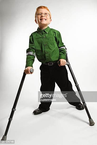 Boy On Crutches Photos And Premium High Res Pictures Getty Images