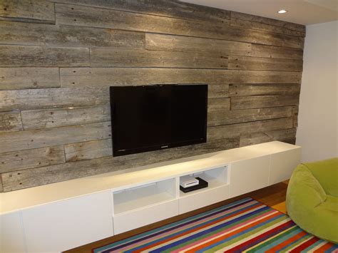 This is project that we helped work on, in which our wood was used to create a gorgeous basement backdrop, perfect for watching movies and hanging out with the family. Modern Barn board Basement Wall. TV too small, reclaimed ...